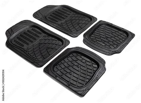 Black rubber car mats isolated on white background. Stock Photo | Adobe Stock