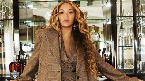 Beyoncé Takes On London in a Brown Plaid Michael Kors Suit with Nude Louboutin Pumps Fashion