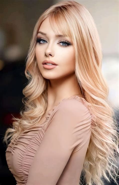 A Woman With Long Blonde Hair And Blue Eyes