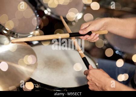 Male Musician Drummer Hands With Drumsticks And Drum Close Up Stock