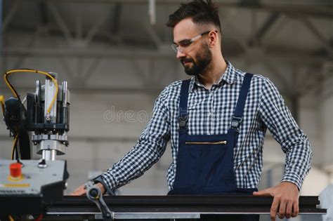 Worker Operating Machine In Factory Stock Photo Image Of Paper