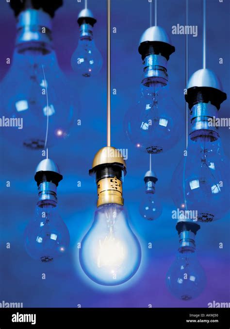 Light Bulbs Hanging From Ceiling Blue Background Only One Lit