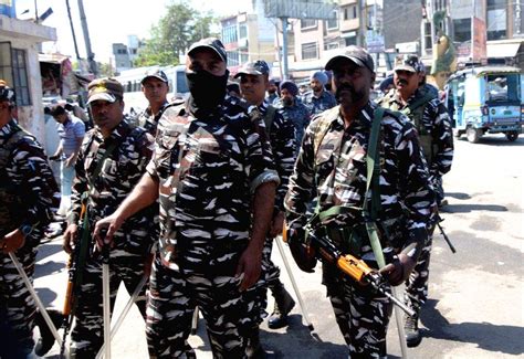 Police And Paramilitary Forces Conduct A Flag March Ahead Of The Upcoming Lok Sabha Elections