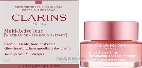 Изглаждащ дневен крем за лице с озаряващ ефект - Clarins Multi-Active ...