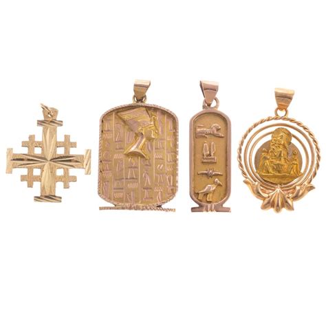 Sold Price: A Collection of Charms & Pendants in Gold - March 4, 0120 12:00 PM EDT