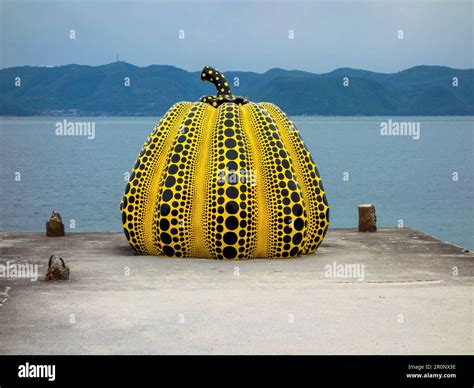 Yellow Pumpkin Sculpture By Japanese Artist Yayoi Kusama On The Island