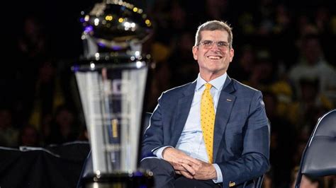 Look Jim Harbaugh Returns To Michigan For Ring Ceremony Follows Through On National Title