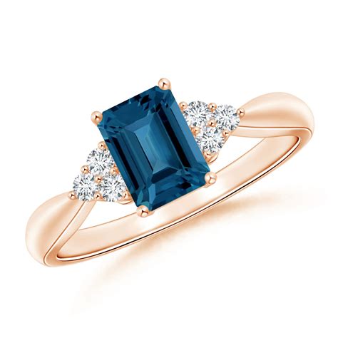 Emerald Cut London Blue Topaz Ring With Trio Diamonds Angara