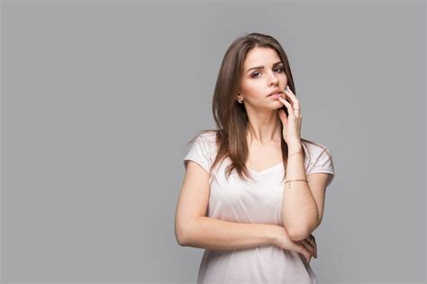 Premium Photo Sensual Portrait Of Beautiful Brunette Woman Posing In Studio