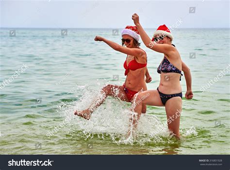 Two Beautiful Girls Bikini Christmas Santa Stock Photo 316801928 Shutterstock
