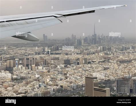 Landing in Dubai, United Arab Emirates. Dubai skyline with Burj Khalifa ...