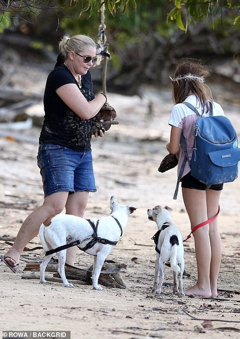Epstein S Sex Slave Virginia Roberts Gathers Driftwood On A Beach In Australia Daily Mail Online