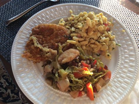 Pork Schnitzel With Spaetzle And Cabbage Mix Pork Schnitzel Food Foodie