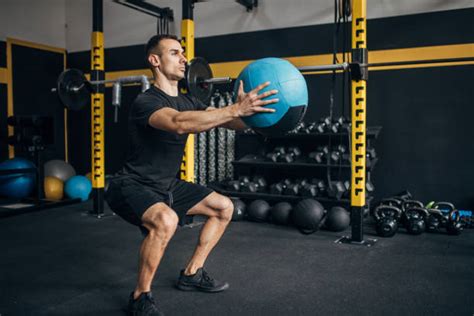 540+ Medicine Ball Squats Stock Photos, Pictures & Royalty-Free Images ...