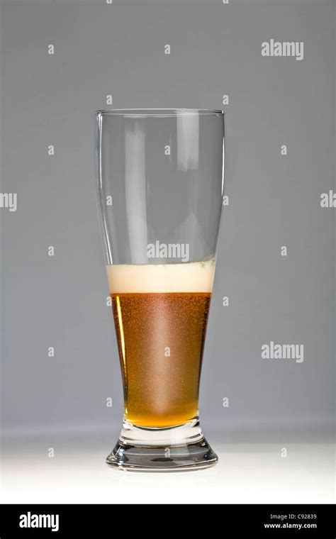 Wheat beer in wheat beer glass Stock Photo - Alamy