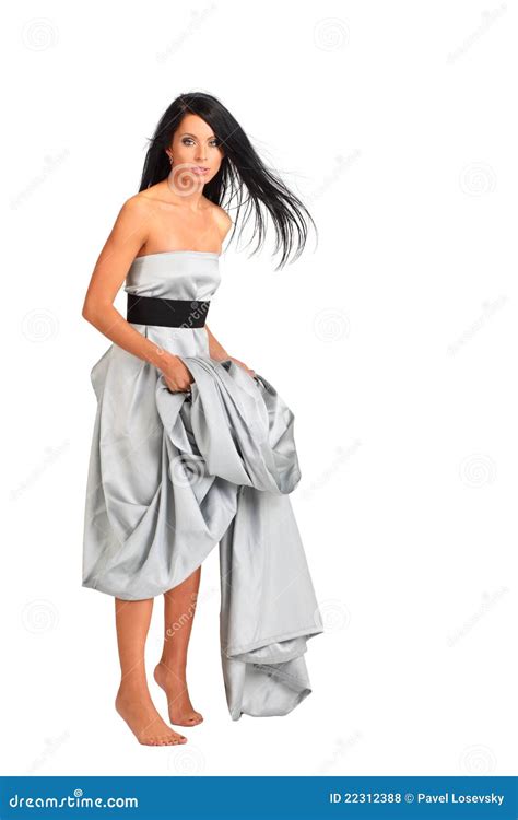 Woman Wearing Long Silver Dress Stands On Tiptoe Stock Photo Image Of