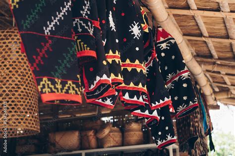 Hanging array of handmade traditional dress of the T'boli women called ...