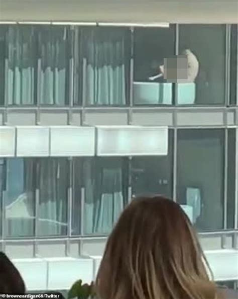 Stunned Office Workers Watch On As Naked Couple In Nearby Apartment