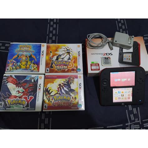 Nintendo 2DS with Pokemon Games and R4 bundle (Can play 3ds games and ...