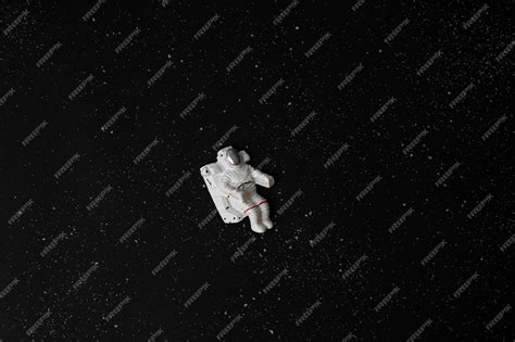 Premium Photo | Astronaut on black space background