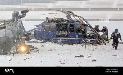 Rescue Workers Rescue Occupants After Two Helicopters Of The German