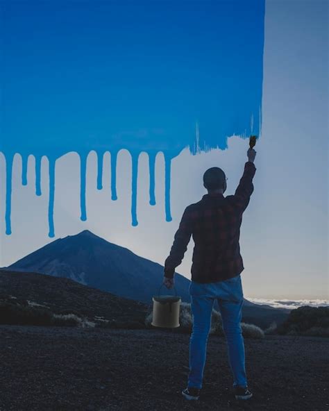 Premium Photo Rear View Of Man Standing Against Clear Sky