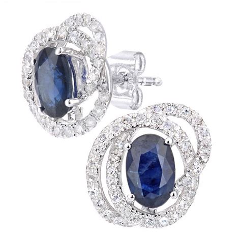 SPARKLD 9ct White Gold Oval Sapphire And 0 25ct Diamond Cluster Stud