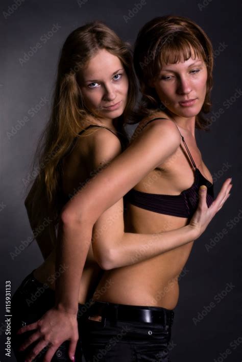 Two Naked Girls Hugging Each Other On A Black Background Gentle Lesbian Stock Photo Adobe Stock