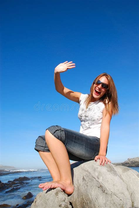 Woman Waving Hand An Attractive Caucasian Young Woman With Sunglasses