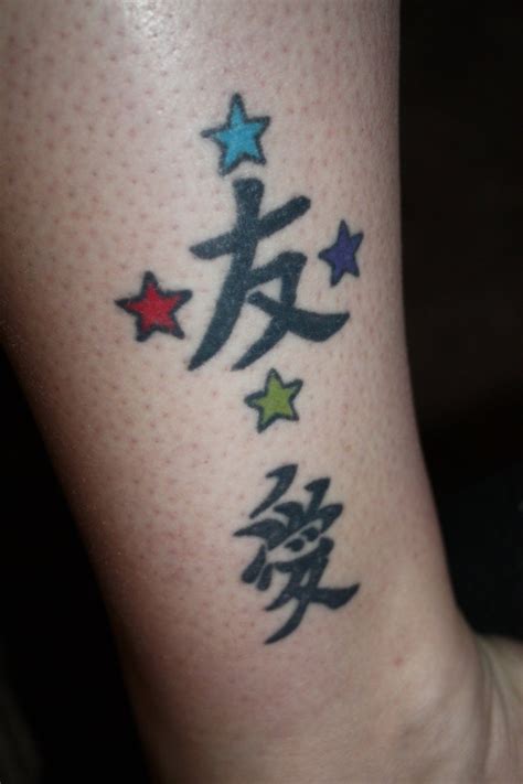 Cute Star And Chinese Symbols Tattoo Design