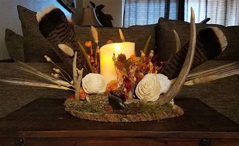 Homemade Centerpiece From Antler Sheds Turkey Feathers And Dried