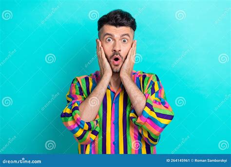 Portrait Of Good Mood Impressed Ecstatic Guy With Brunet Haircut Wear Colorful Shirt Palms On