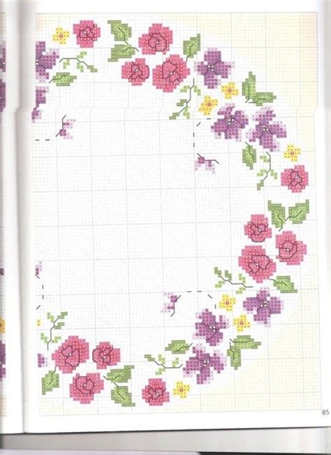 A Cross Stitch Pattern With Flowers On It