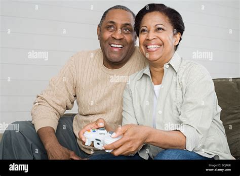 Mature Couple Playing Video Game Stock Photo Alamy