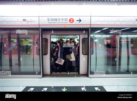 Tsim Sha Tsui Station On The Mtr In Hong Kong With A Packed Train Ready