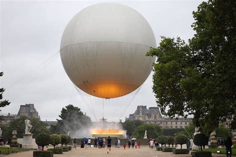 Paris 2024 Olympic Cauldron flies over Paris with a fuel-free flame