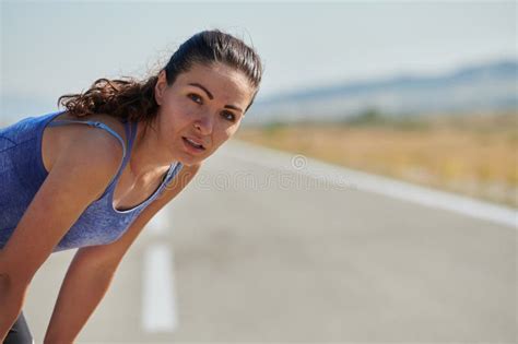 Close Up Portrait Of Determined Athlete Resting After Intense Workout