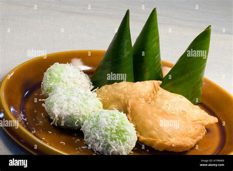 Traditional Malaysian Kuih Or Snacks Onde Onde Kuih Kochi And Curry