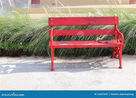 Old Red Wooden Bench in the Garden Stock Image - Image of blossom, park ...