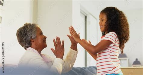 Vid O Stock Granddaughter And Grandmother Playing Clapping Games In