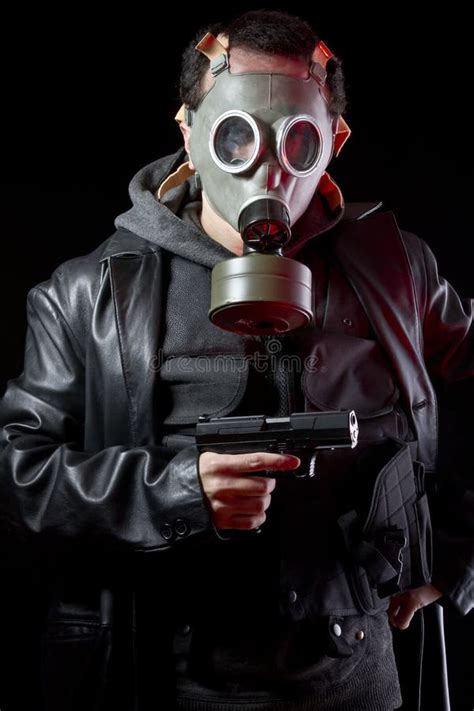 Man With Gas Mask And Gun Stock Photography Image 27276992