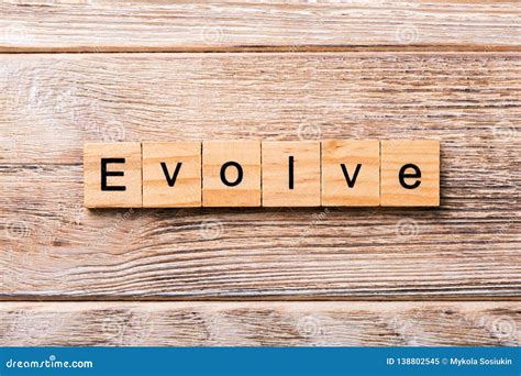 Evolve Word Made With Wooden Blocks Concept Stock Photo Cartoondealer