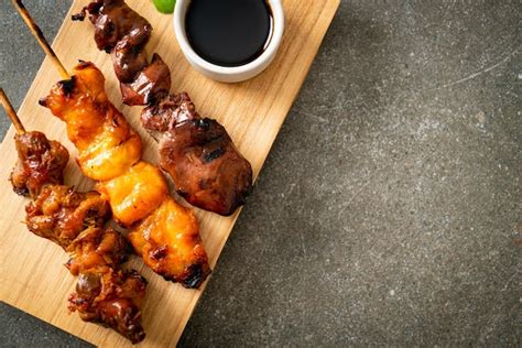 Premium Photo | Japanese chicken grill or yakitori serve in izakaya style