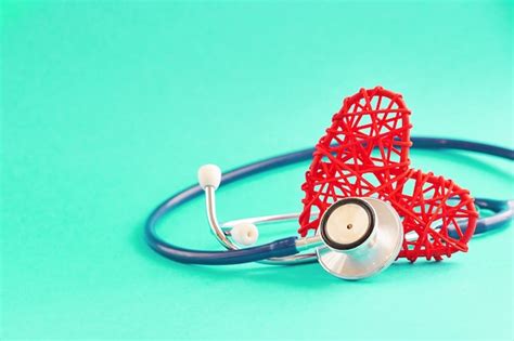 Premium Photo Stethoscope And Red Heart On Blue Background Medical