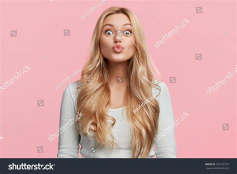 Portrait Adorable Blonde Woman Pouts Lips Stock Photo 793122172