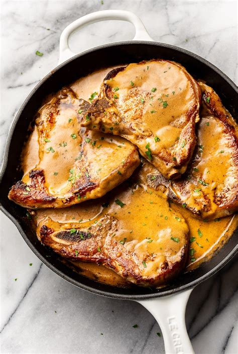 These Tender And Juicy Pork Chops Are Smothered In A Perfectly Flavored