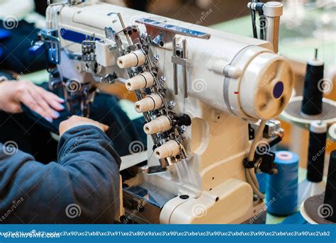 Industrial Overlock Sewing Machine In Work Stock Photo Image Of