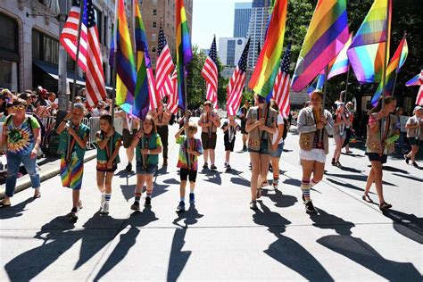 PHOTOS: Thousands wind through downtown for 45th annual Seattle Pride ...