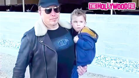 elon musk  son  ae   musk greet fans  arriving  super