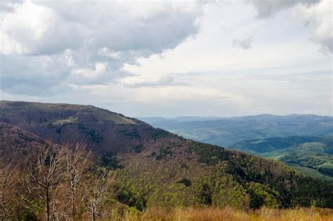 Premium Photo | Mountains and hills rainy clouds